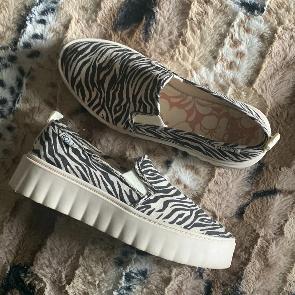 Roxy Zebra Print Platform Slip-On Sneakers in Black and Cream